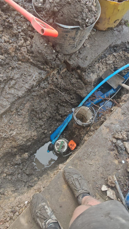 Underground pipe leak located and exposed